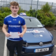 Darragh Cassidy posing with PASS certificate